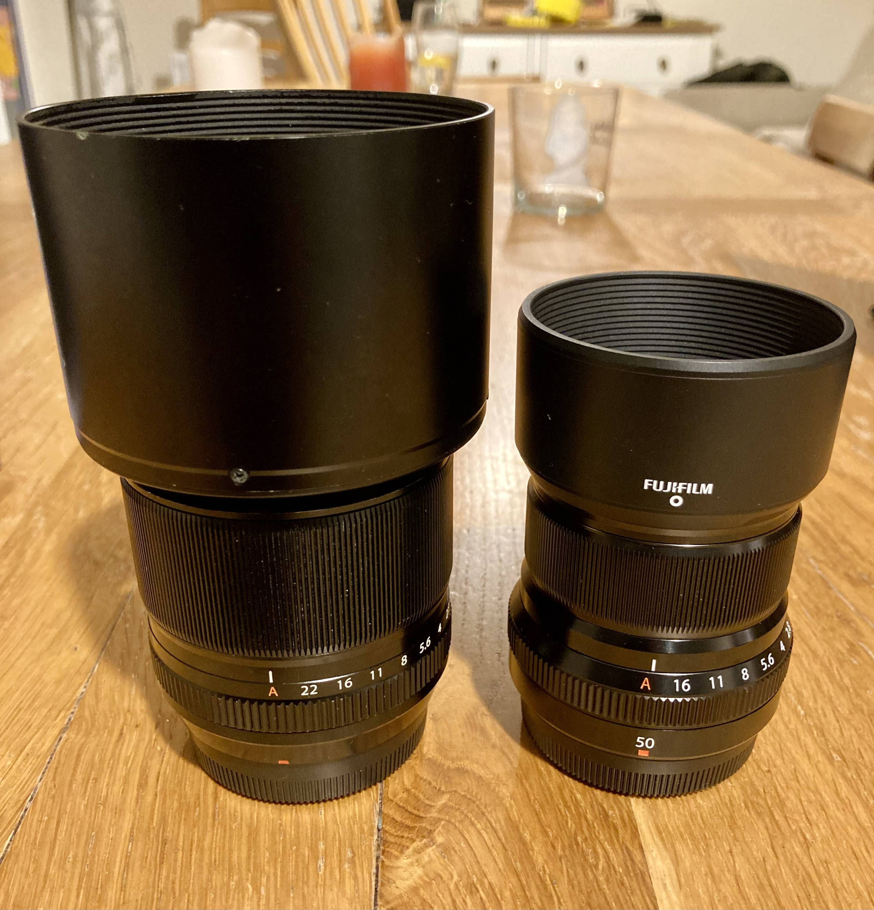Two lenses with hoods